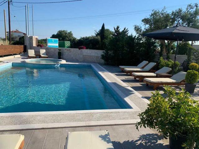 Sinodinos Deluxe Apartments Afytos Bagian luar foto